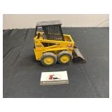 Metal mustang skid loader