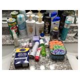 Shampoo, hair spray, hair curlers , bathroom