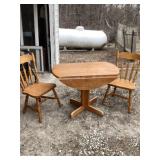 Round drop leaf table with two chairs,