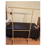 Rolling adjustable clothes rack