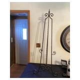 Metal easle approximately 52 inches tall