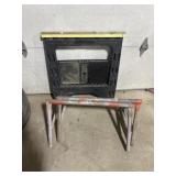 Plastic saw horse and metal stands