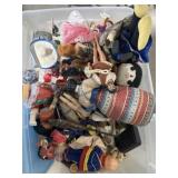 Tote of vintage dolls