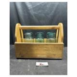Blue ball jars in wooden crate