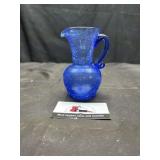 Small blue crackle blown glass pitcher