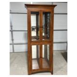 Wooden lighted display cabinet with glass shelves