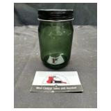 Green glass jar