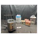 Toaster, metal rack, tin cans