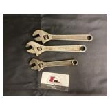 Adjustable wrenches