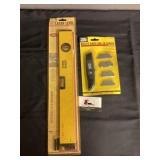 Laser level and utility knife