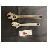 Adjustable wrenches