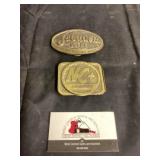 NC+ and Jacques seed belt buckles