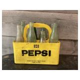 Plastic Pepsi case with glass bottles