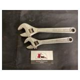 Adjustable wrenches