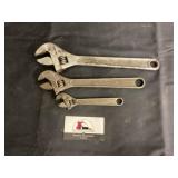 Adjustable wrenches