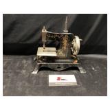 Vintage mini sewing machine