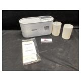 Automatic toothpaste dispenser