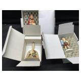 Hummel figurines and bell