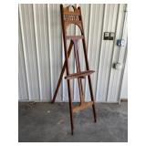 Easel approximately 70 inches tall