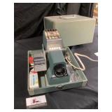 Argus slide projector lights up