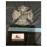 Cast iron Firemans symbol