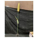 Metal corn yard art approximately 60 inches tall