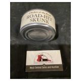 Chicken of the road road hit skunk