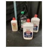 Full bottles of charcoal, lighter fluid, and t