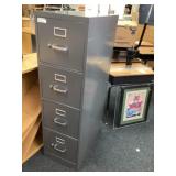Metal four drawer file cabinet approximately 15 x