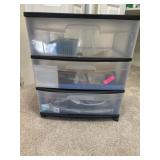 Plastic storage cabinet with misc craft supplies