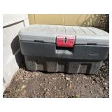 Garden tools in storage tote