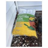 2 bags of potting soil