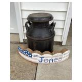 Cream can and name block