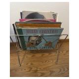 Records in metal stand