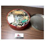 Large tin of buttons