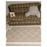 Couch, area rug, pillows
