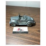 Pewter car bank - has coins in it but unknown