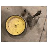 Guide wheel and implement part