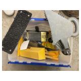 Tote of drywall supplies