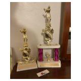 Two golf trophies
