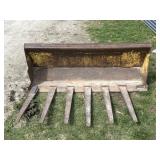 Skid loader manure tine bucket