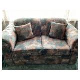 Loveseat with pillows