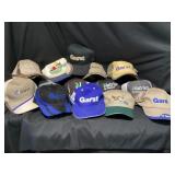 Assorted seed company hats