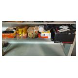 Shelf of tins & misc