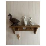 Duck decor and wooden shelf