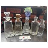 Vintage glass bottles, decanters, bud vase