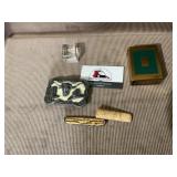 Pocket knife, belt, buckle, cig case