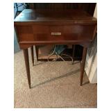 Sewing machine cabinet