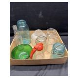 Glass jars, bottles, green glass bowl