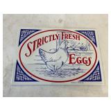 Metal egg sign 11 in x 9 in